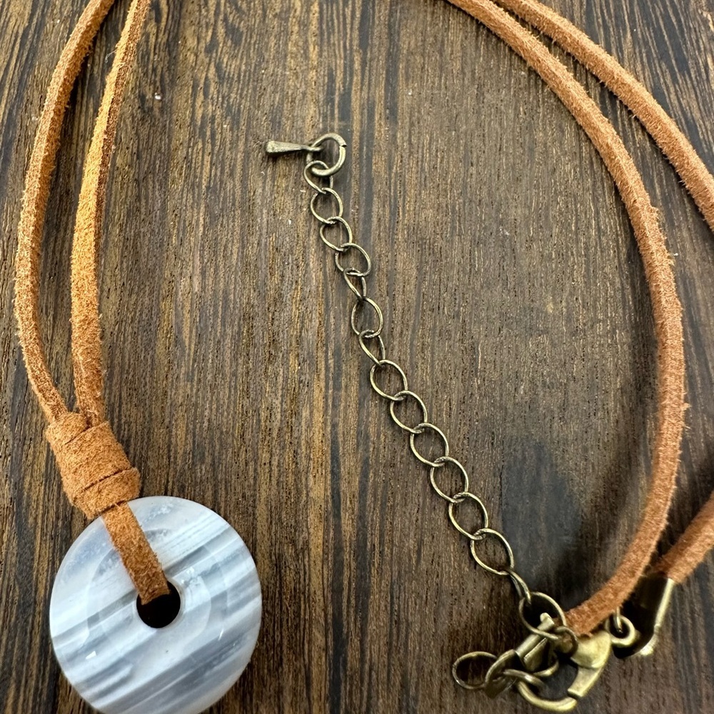 Small Banded White Agate Donut Pendant Necklace on Brown Suede - Picture 13 of 14
